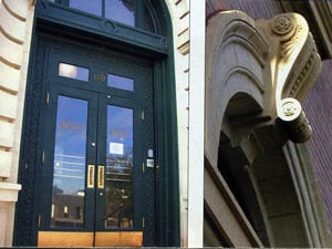 Original pocket doors on the front of the building slide into 36” walls. Ornamental cornices highlight the massive arched windows around the building’s perimeter.